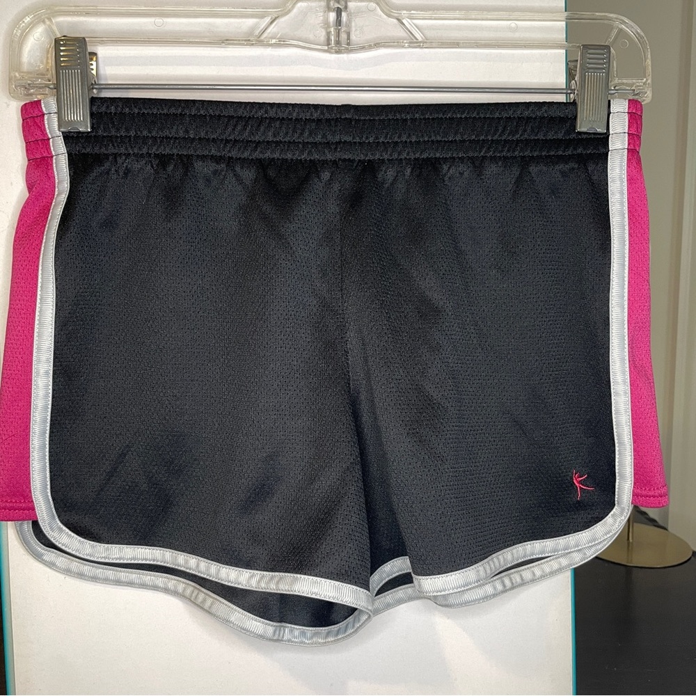 black and pink running shorts